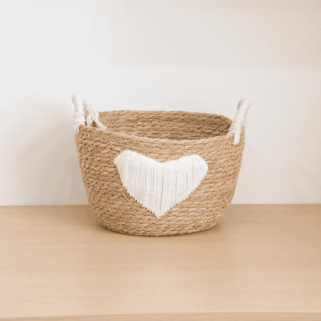 Handwoven storage basket with heart design Bowlift
