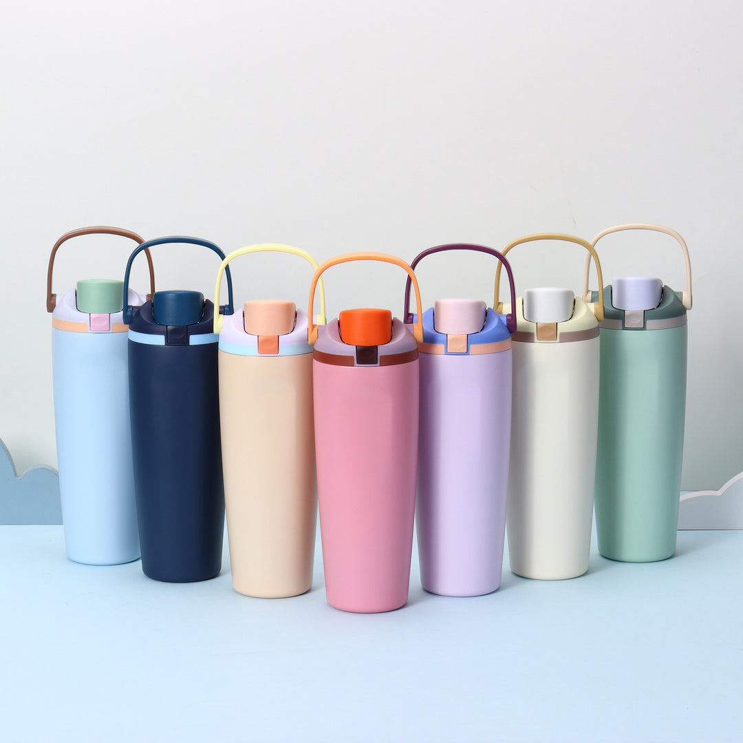 Women's insulated drinking bottle with ergonomic carry handle Bowlift