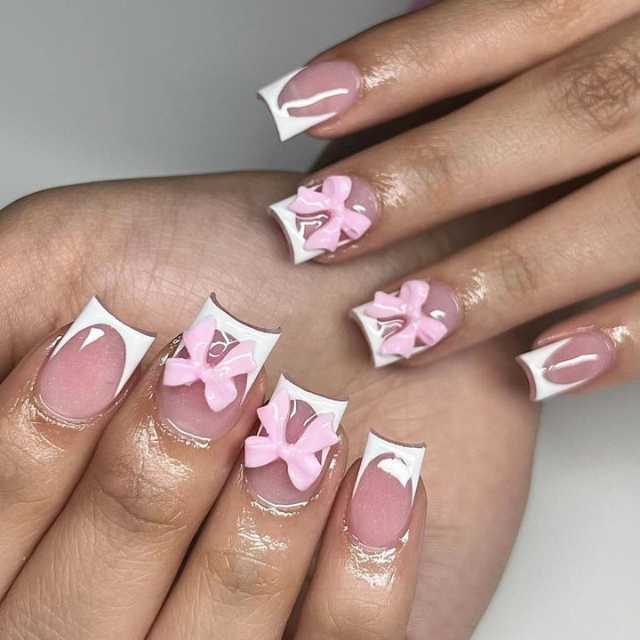 Artificial nails with cute bow designs Bowlift