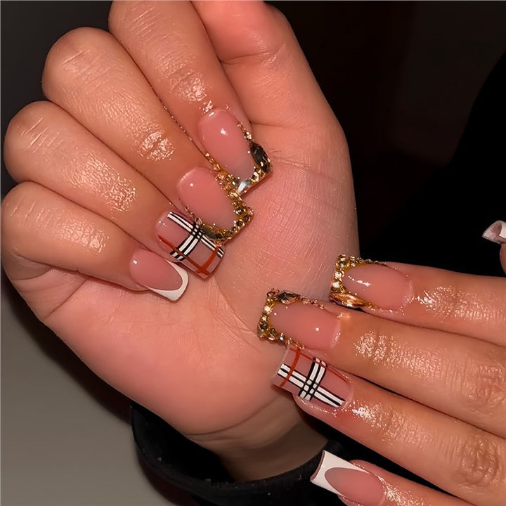 Decorative Press-On Nail Art with Gold Accents Bowlift