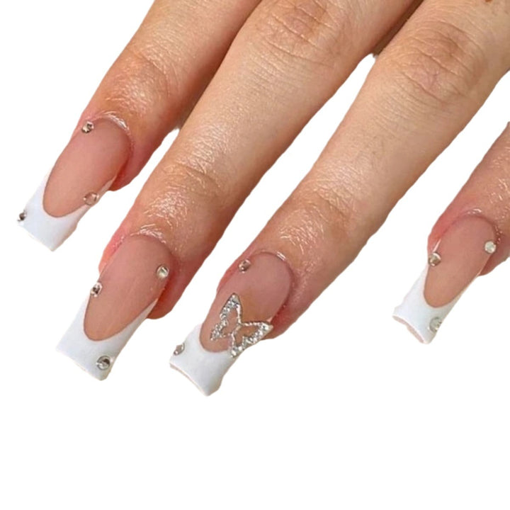 Elegant Stiletto Nail Extensions with Rhinestone Accents Bowlift