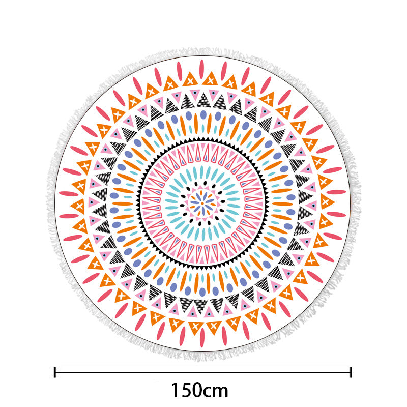 Round beach towel with colorful, tropical floral pattern and fringe decoration Bowlift