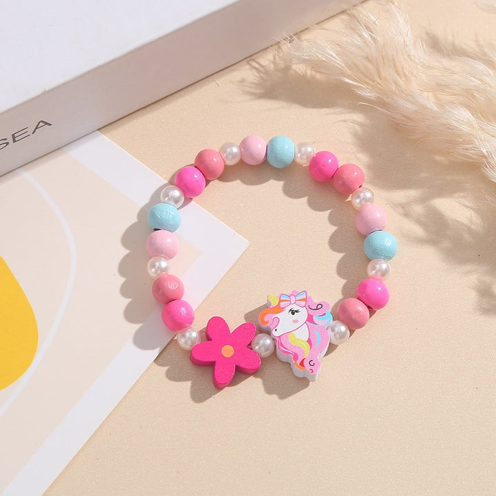 Playful children's bracelet with unicorn and flower motif Bowlift