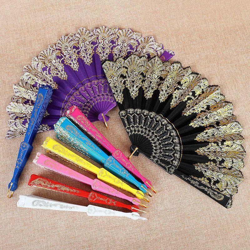 Women's fan with exquisite filigree ornamentation Bowlift