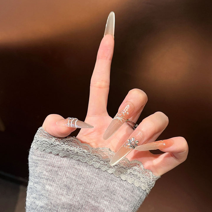 Elegant Stiletto Press-On Nail Extensions with Rhinestones Bowlift
