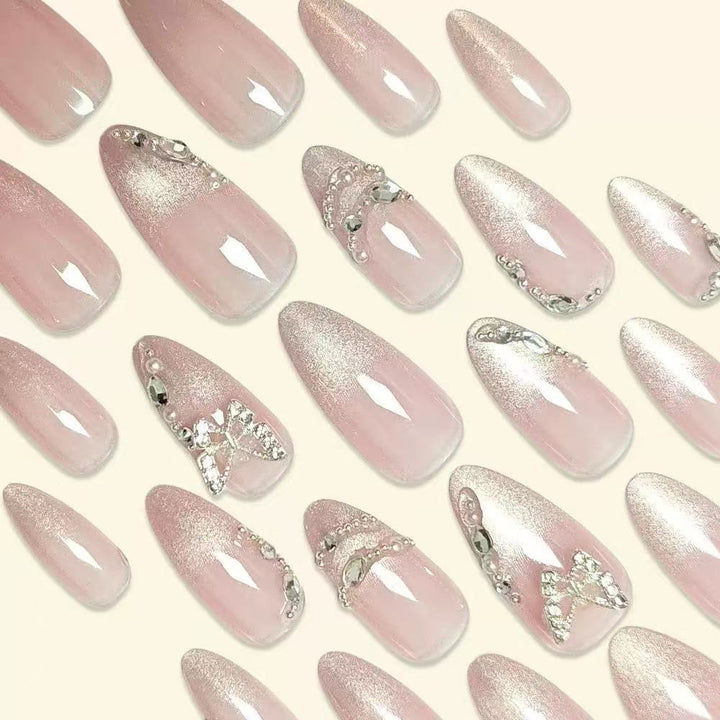 Artistic Stiletto Nail Extensions with Rhinestone Accents Bowlift