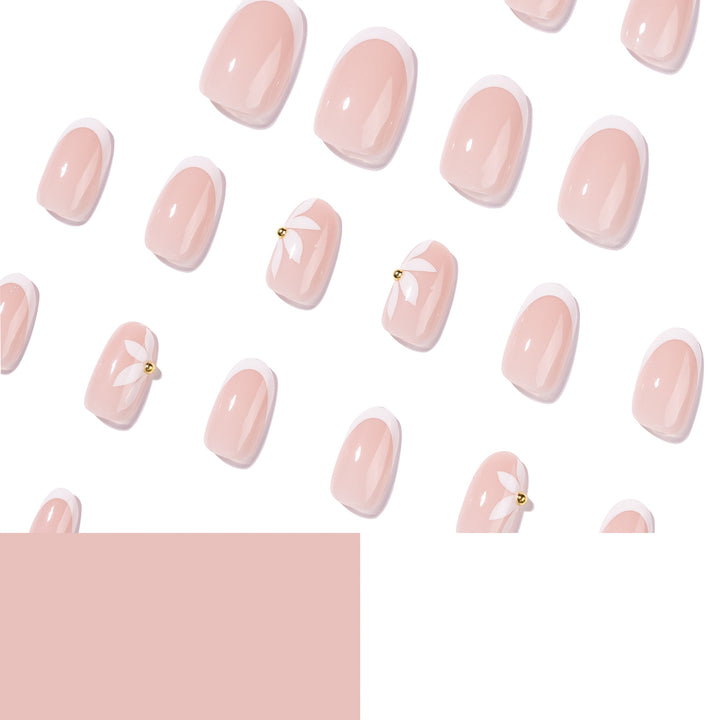 Artful French nails with delicate flowers and glitter accents Bowlift