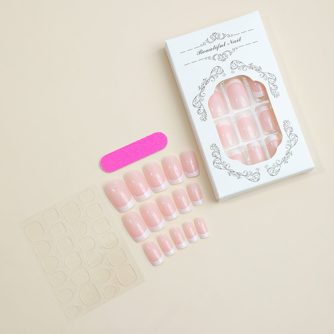 Artificial nail set with elegant French tip decorations Bowlift