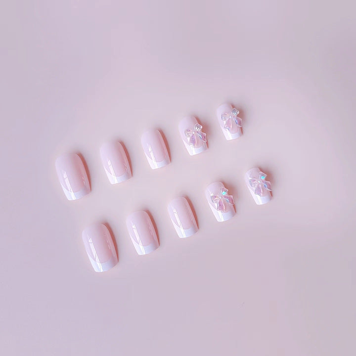 Acrylic nail set with elegant French tips and 3D details Bowlift