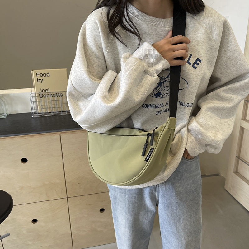 Shoulder bag with adjustable strap and multiple compartments Bowlift