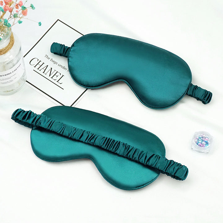 Women's breathable satin eye mask with ergonomic curvature, soft padding and gathered anti-slip band Bowlift