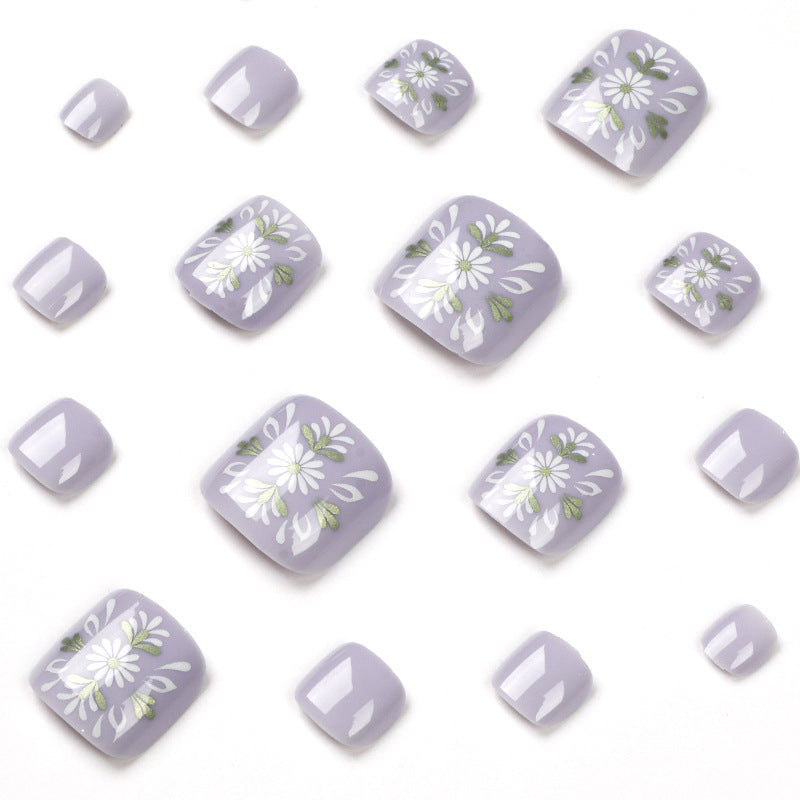 Artistic toenail design with elegant floral design Bowlift