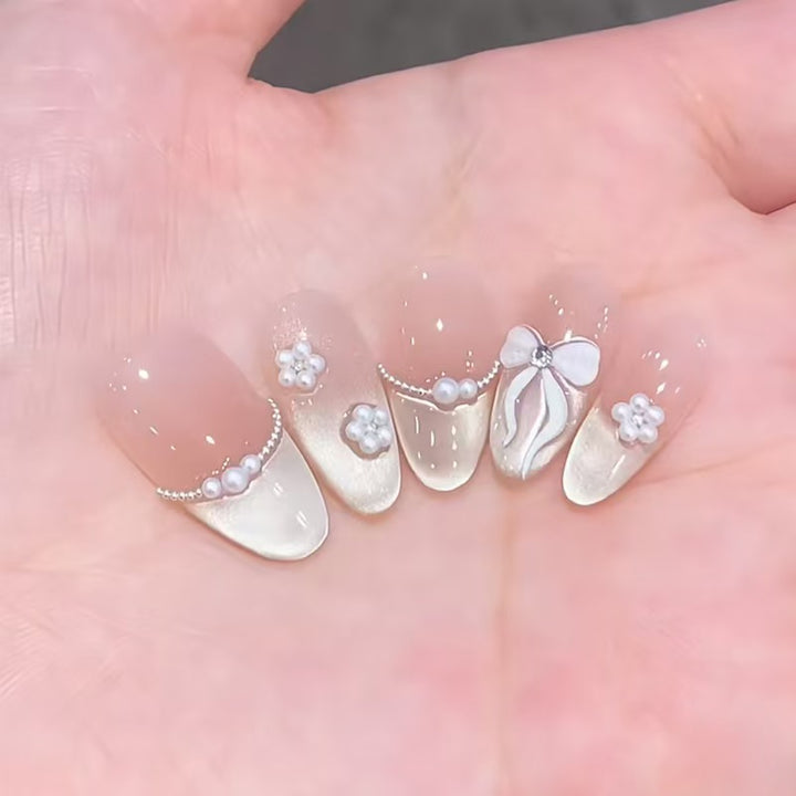 Artificial nails with elegant, adorned tips Bowlift