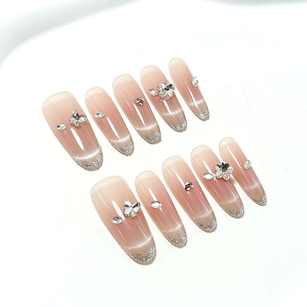 Glamorous artificial nails with rhinestone decorations Bowlift