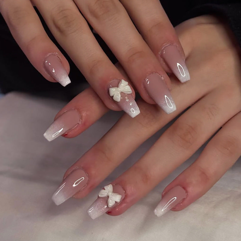 Artful Nail Art with Flower Design and Blue French Tip Bowlift