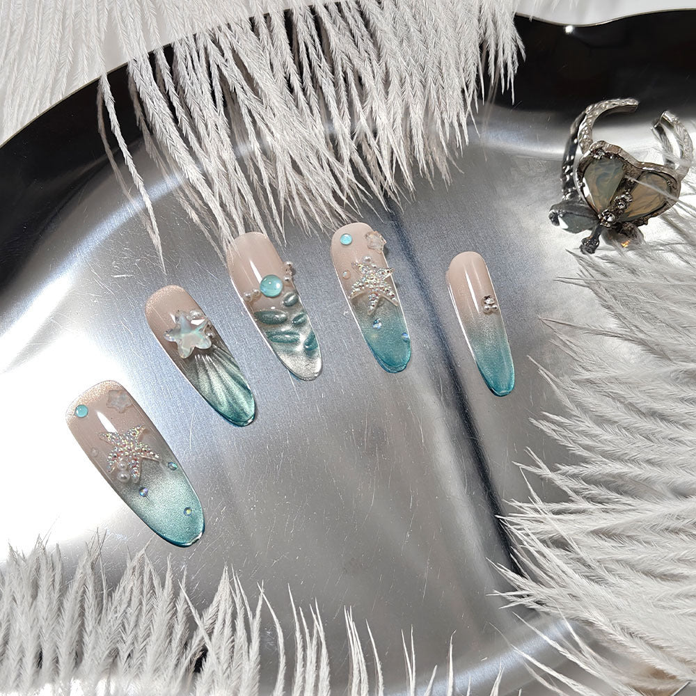 Elegant Nail Art with Ocean Theme and 3D Accents Bowlift