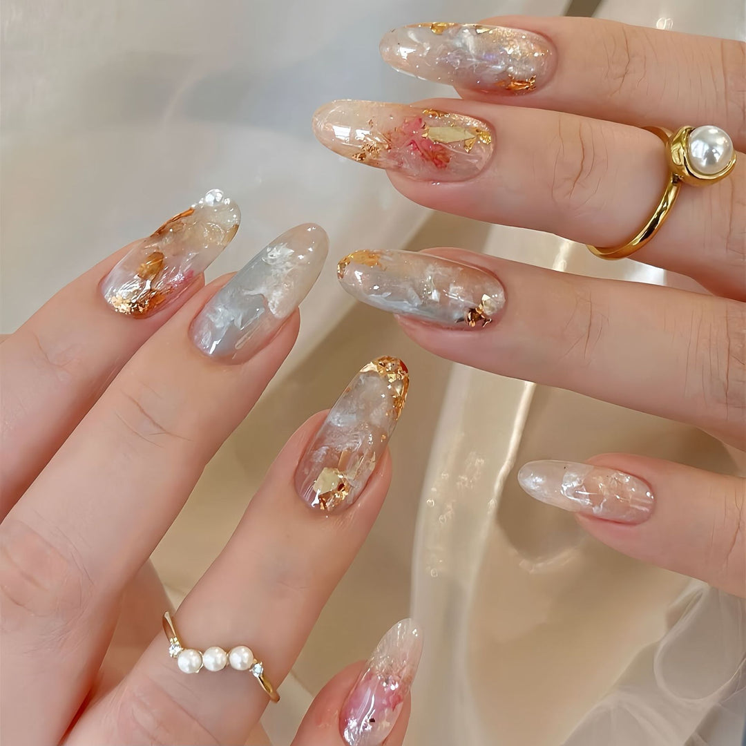 Artificial nails with glamorous metallic details and sparkling design Bowlift