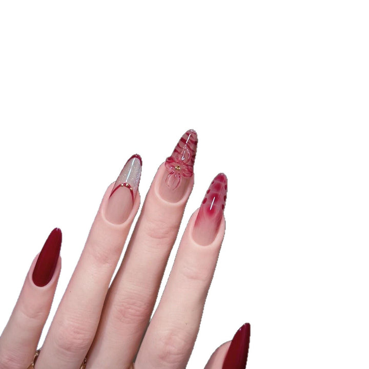 Artificial nails with floral and glamour details Bowlift