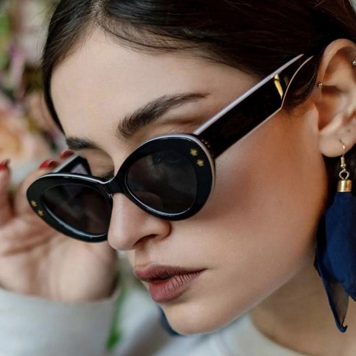 Ladies Cat-Eye Sunglasses with Luxurious Plastic Frame and Decorative Accents Bowlift