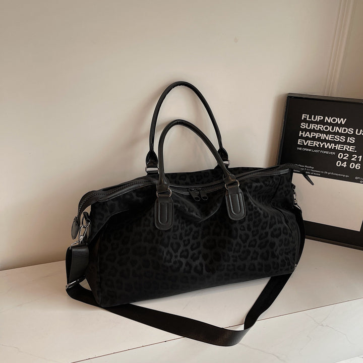 Elegant Travel Bag with Innovative Leopard Print Bowlift