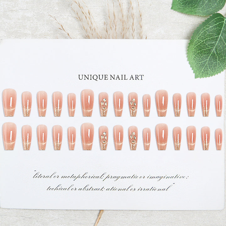 Artificial nail set with sparkling glitter and 3D applications Bowlift