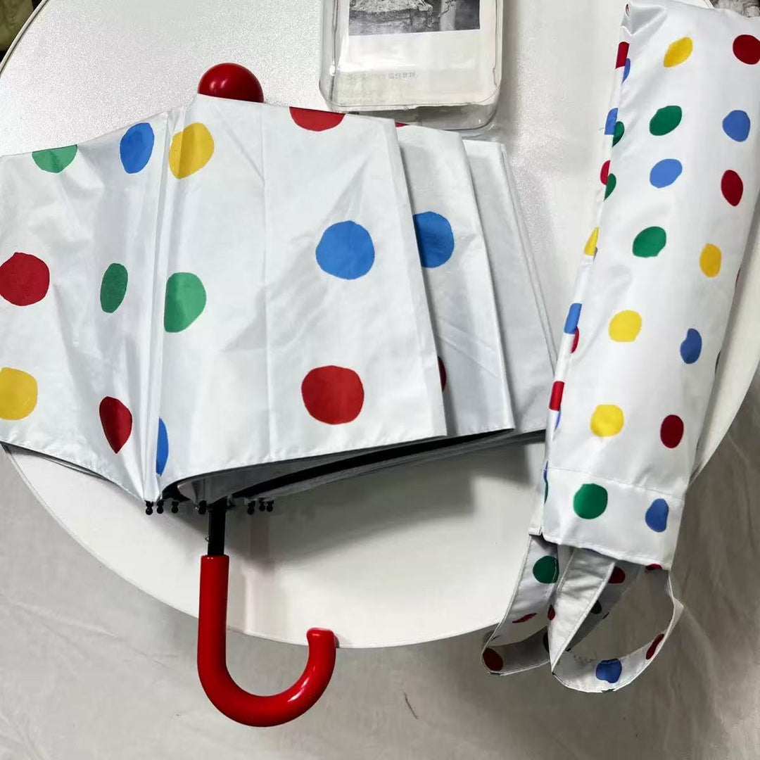 Ladies designer foldable umbrella with colorful polka dot pattern Bowlift