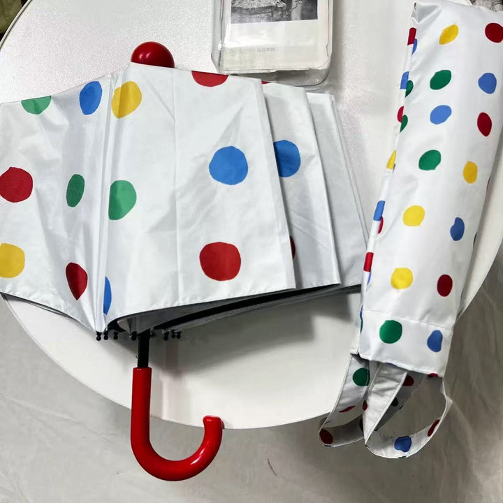 Ladies designer foldable umbrella with colorful polka dot pattern Bowlift