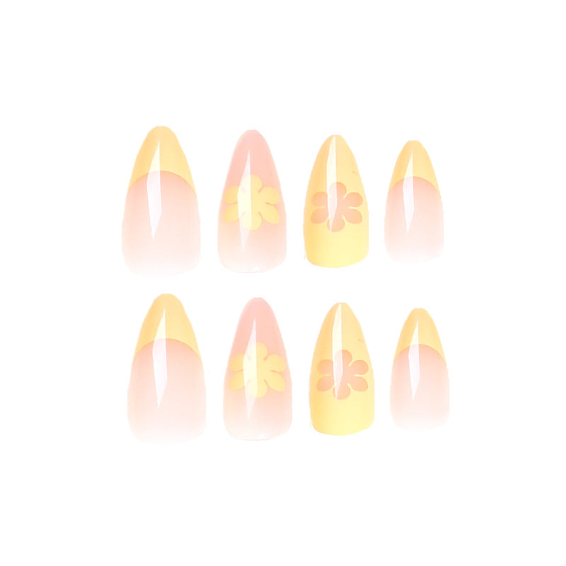 Artful nail designs with floral accents and gradient Bowlift