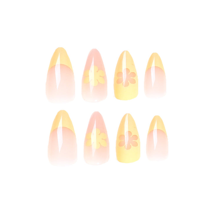 Artful nail designs with floral accents and gradient Bowlift