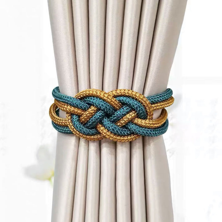 Decorative curtain tieback with braided design Bowlift