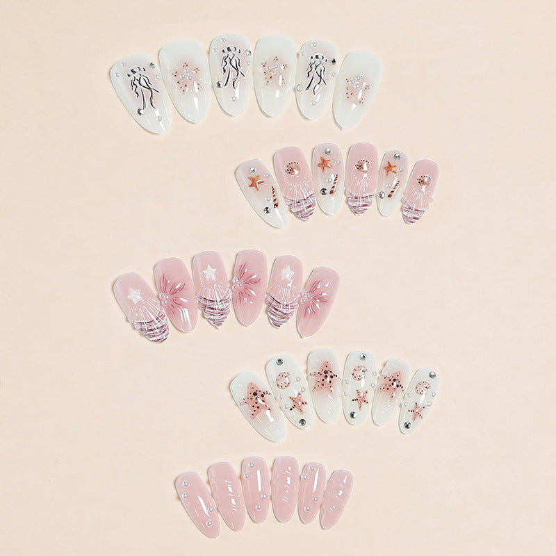 Artificial nails with maritime motifs and pearl embellishments Bowlift