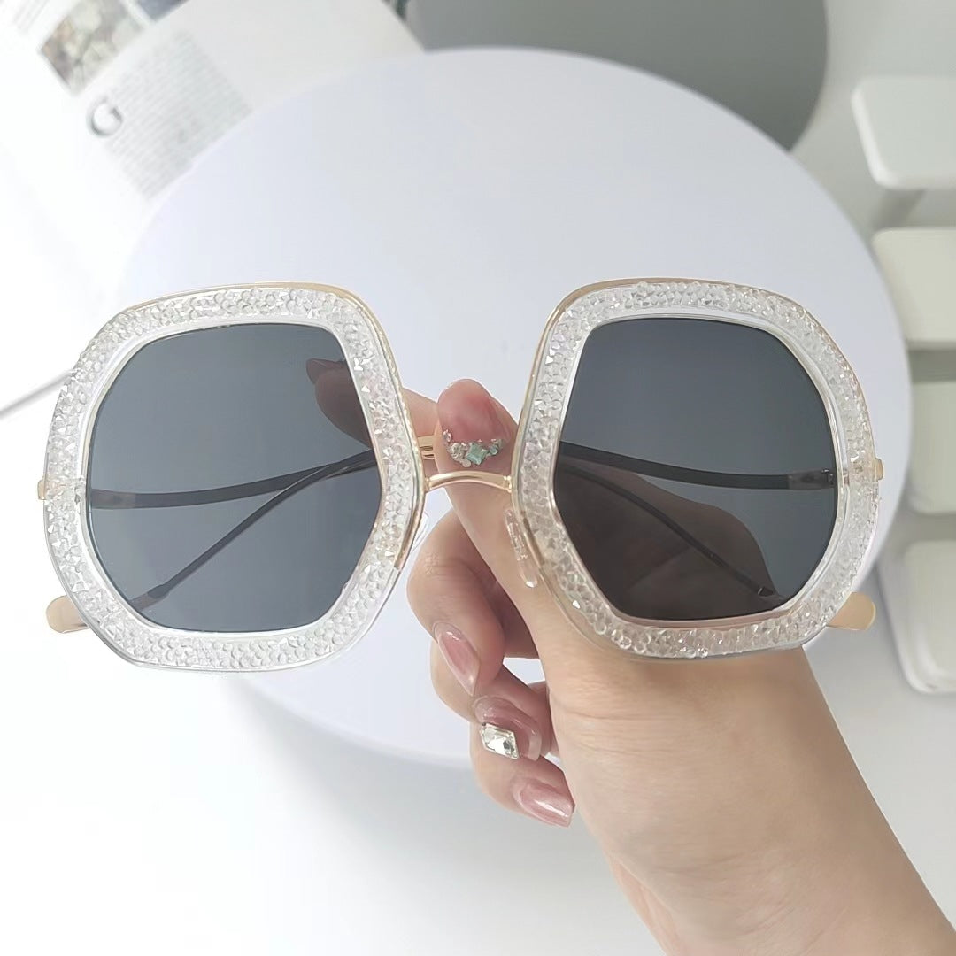 Ladies extravagant sunglasses with sparkling frame Bowlift