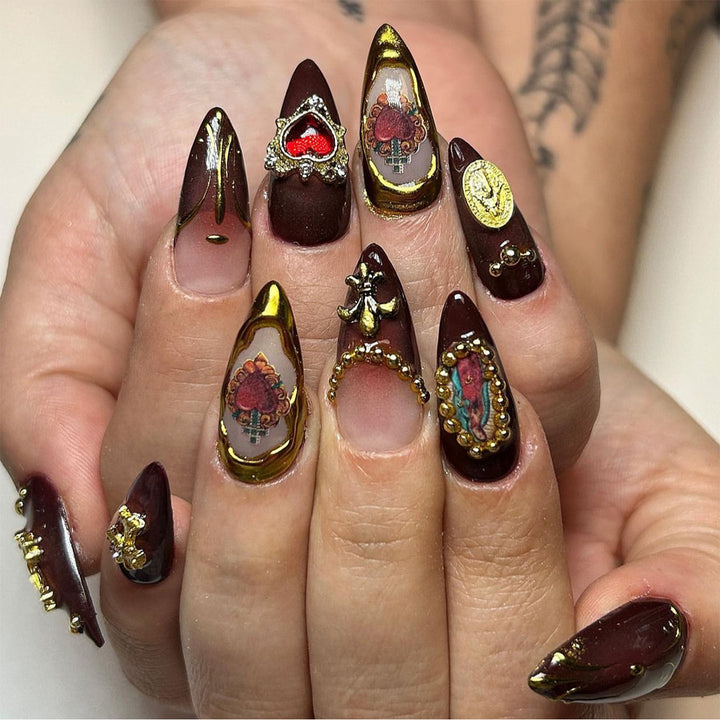 Artistic stiletto nails with detailed embellishments Bowlift