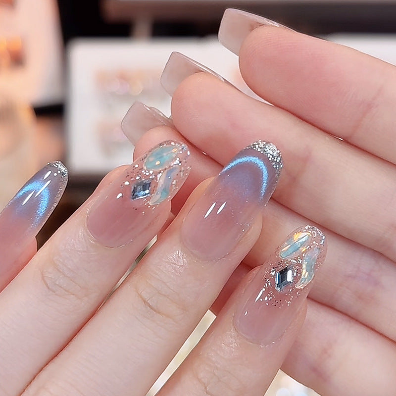 Acrylic nail set with elegant glitter effect and beautified embellishments Bowlift