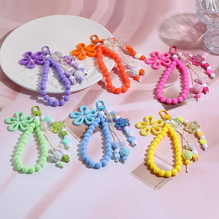 Playful keychain with flower and butterfly details Bowlift