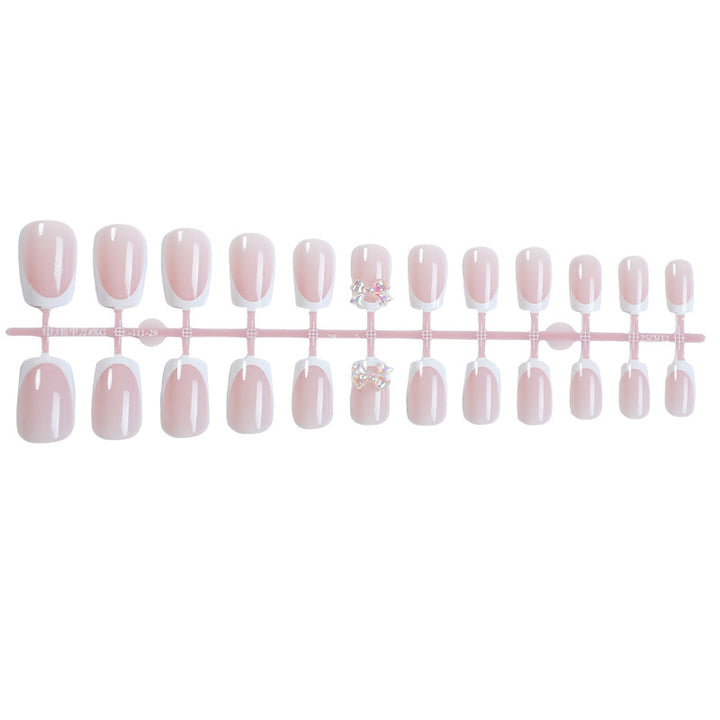 Elegant Glossy Press-On Nails with Jewel Accents Bowlift