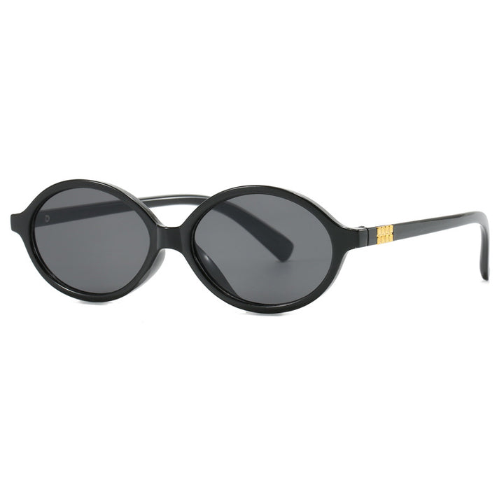 Women's fashionable sunglasses with oval frame and golden accents Bowlift