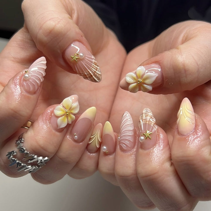 Artful nail art with floral motifs and elegant accents Bowlift