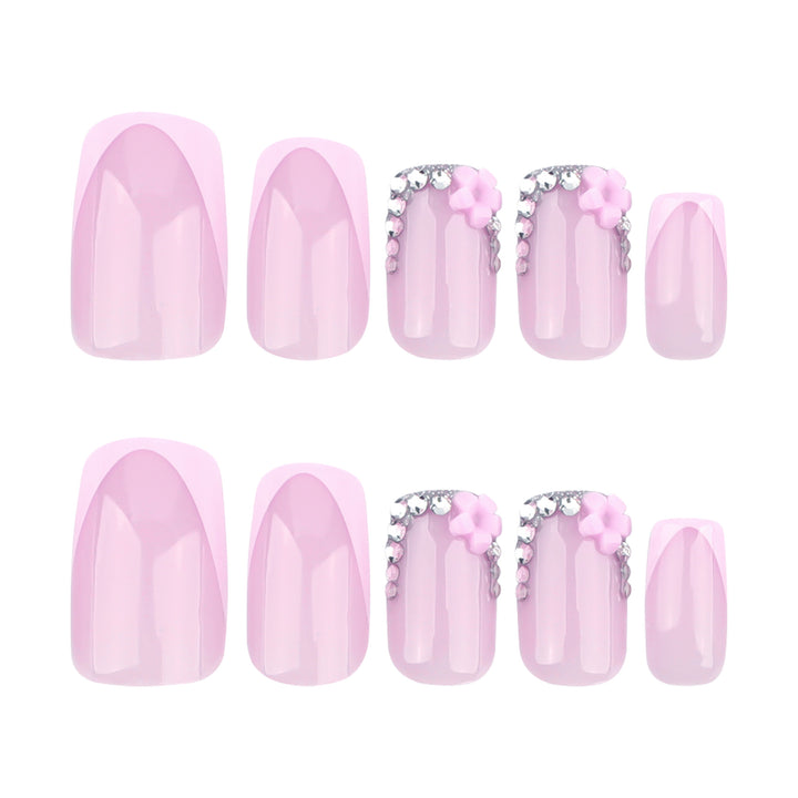 Artful gel nails with elegant floral design and glitter accents Bowlift