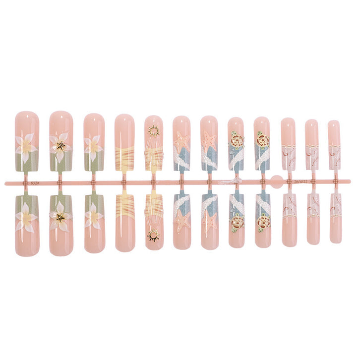 Creative acrylic nail set with floral and maritime accents Bowlift