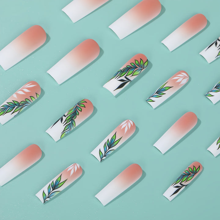 Artificial nails with elegant ombre design and floral accents Bowlift