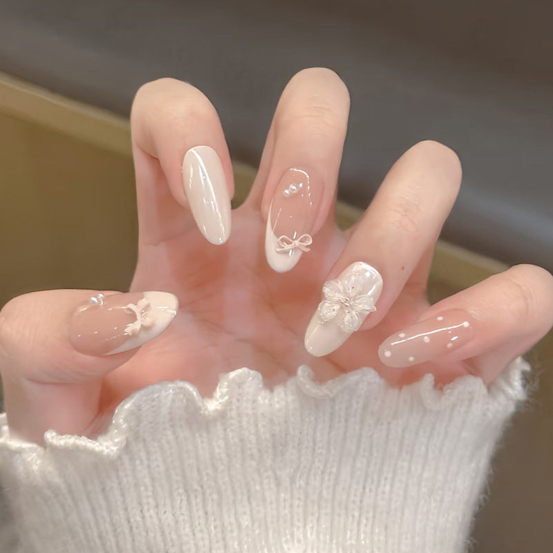 Elegant Press-On Nail Set with Artistic Detailing Bowlift