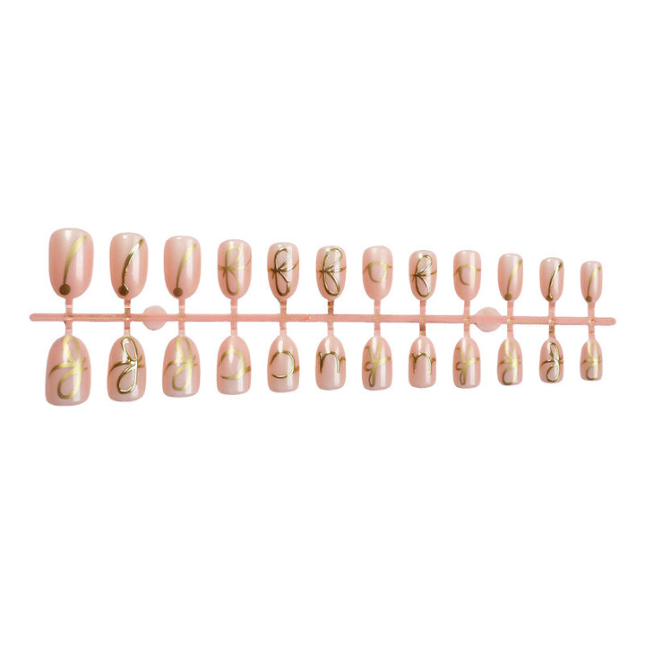 Elegant Press-On Nail Art Set with Stylish Gold Accents Bowlift