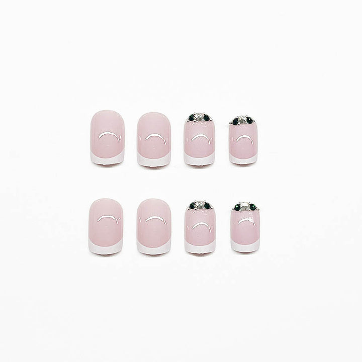 Art nail set with elegant French design and glittering accents Bowlift