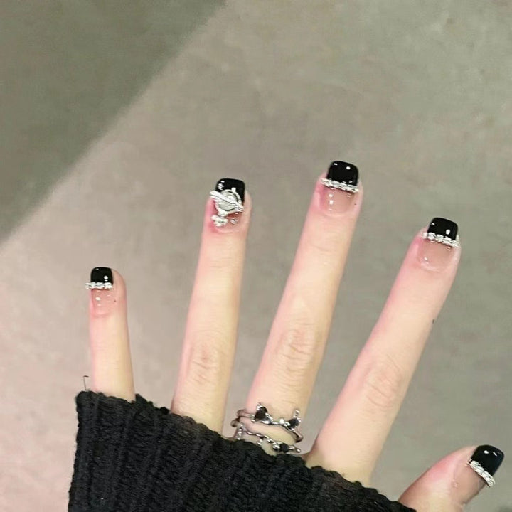 Glamorous artificial nail set with sparkling crystal embellishments Bowlift