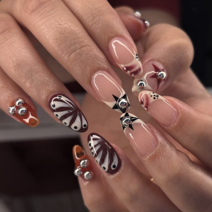 Artistic acrylic nails with creative 3D decorations Bowlift