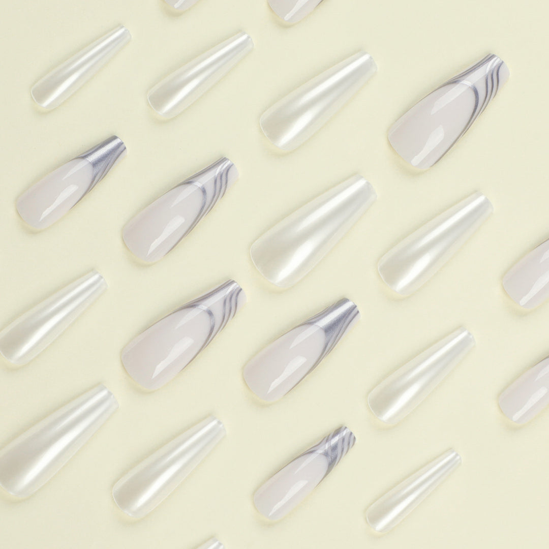 Artificial nail extensions with marbled design Bowlift