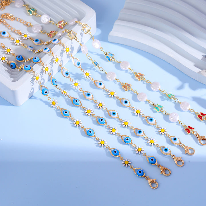 Eye Charm and Daisy Bracelet Bowlift