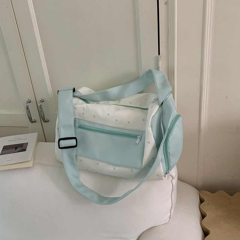 Sporty shoulder bag with practical slip pockets Bowlift