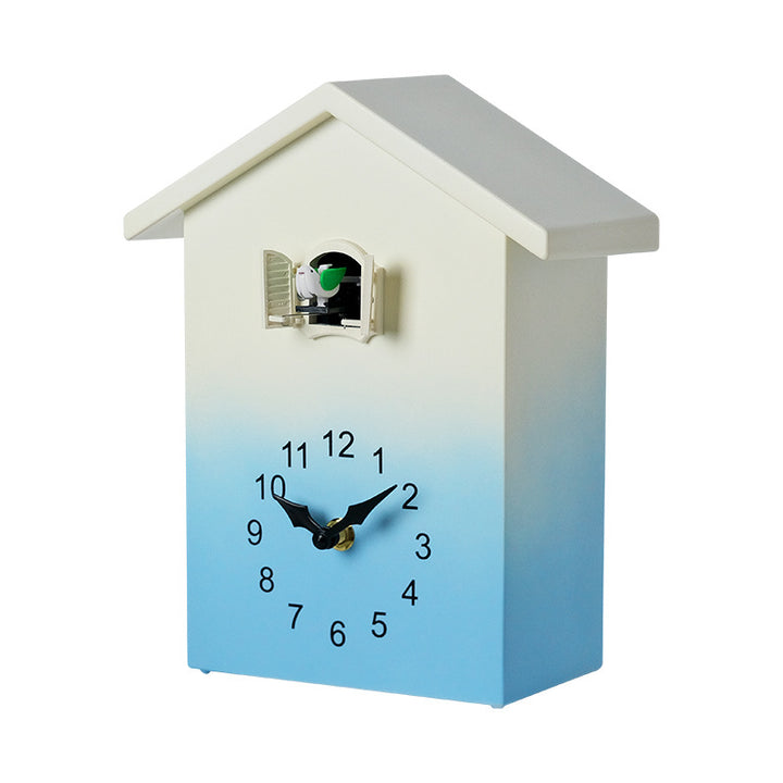 Cuckoo clock in creative house design Bowlift